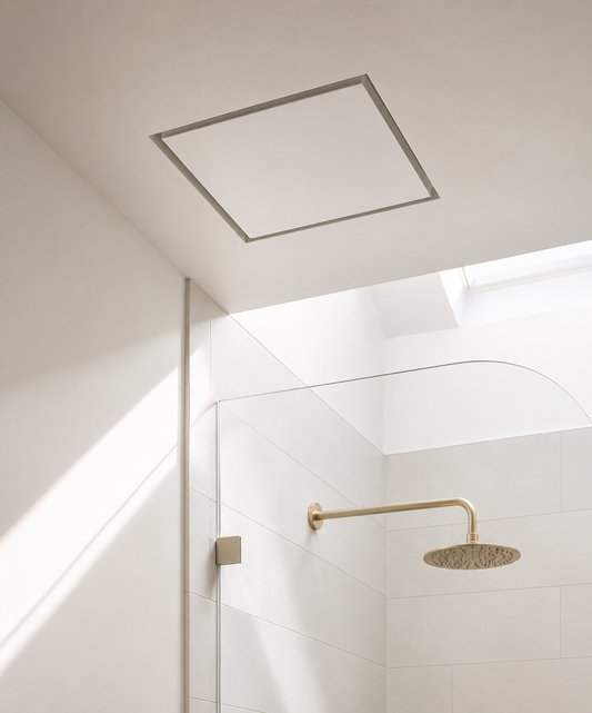 Seam 14×14 flush vent installed in a sun-lit bathroom — large flush register integrating cleanly with the surrounding surface, no protruding frame, no shadow line