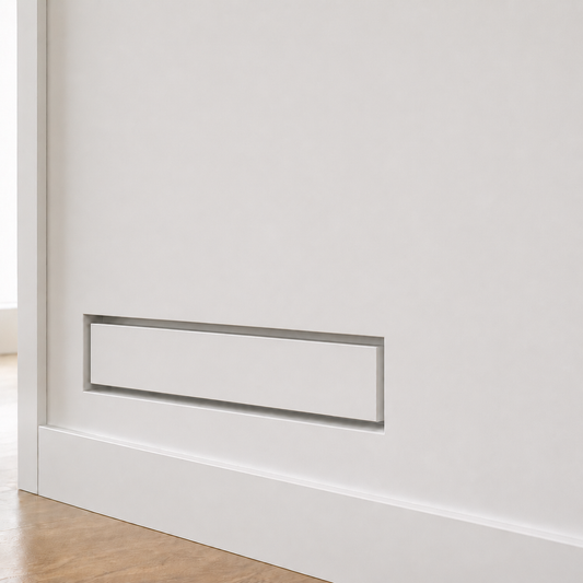 Seam 4×12 flush wall vent installed flush in a clean white wall — proof of the integrated, no-frame finish that makes the vent visually disappear into the wall surface